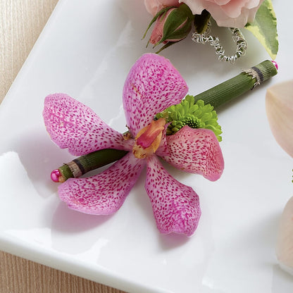 Pink Mokara Boutonniere –  Flower Garden Florist, Fort Worth TX