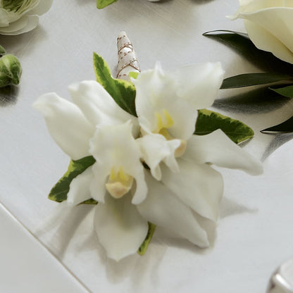 White Mini Cymbidium Boutonniere –  Flower Garden Florist, Fort Worth TX